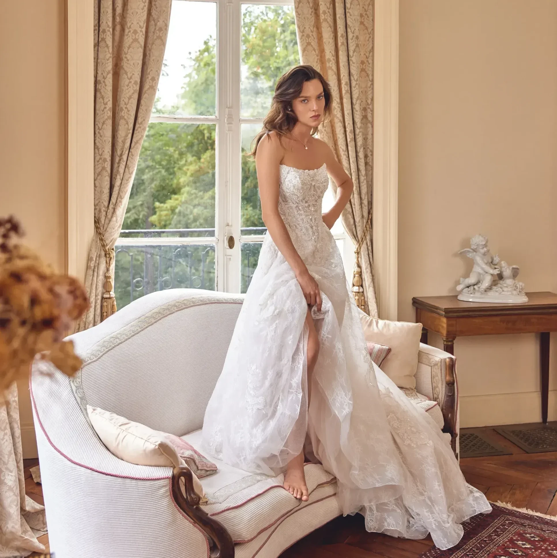 Photo of the model wearing a bridal gown