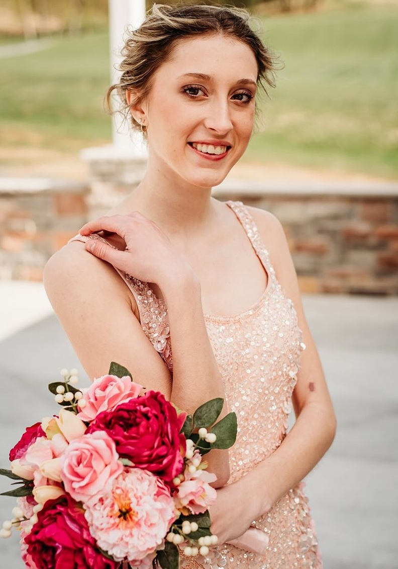 Photo of the model wearing a bridal gown
